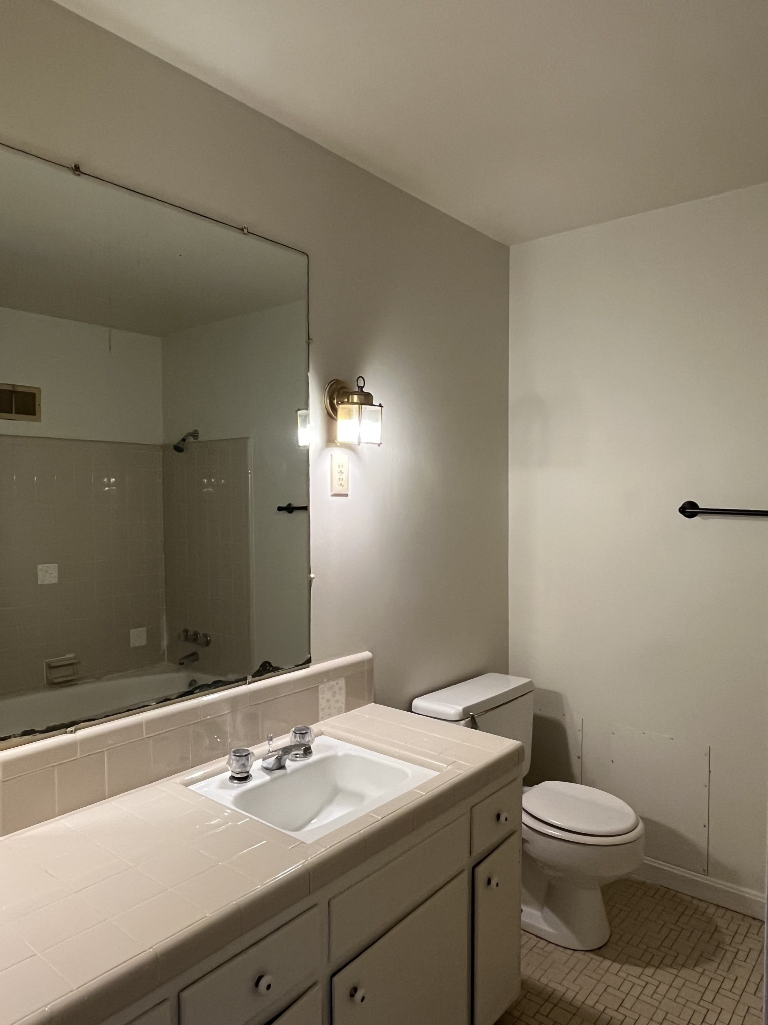 14403 Newstead Road Herndon, KY 42236 - Photo 13 of 25 a bathroom with a sink a toilet and mirror