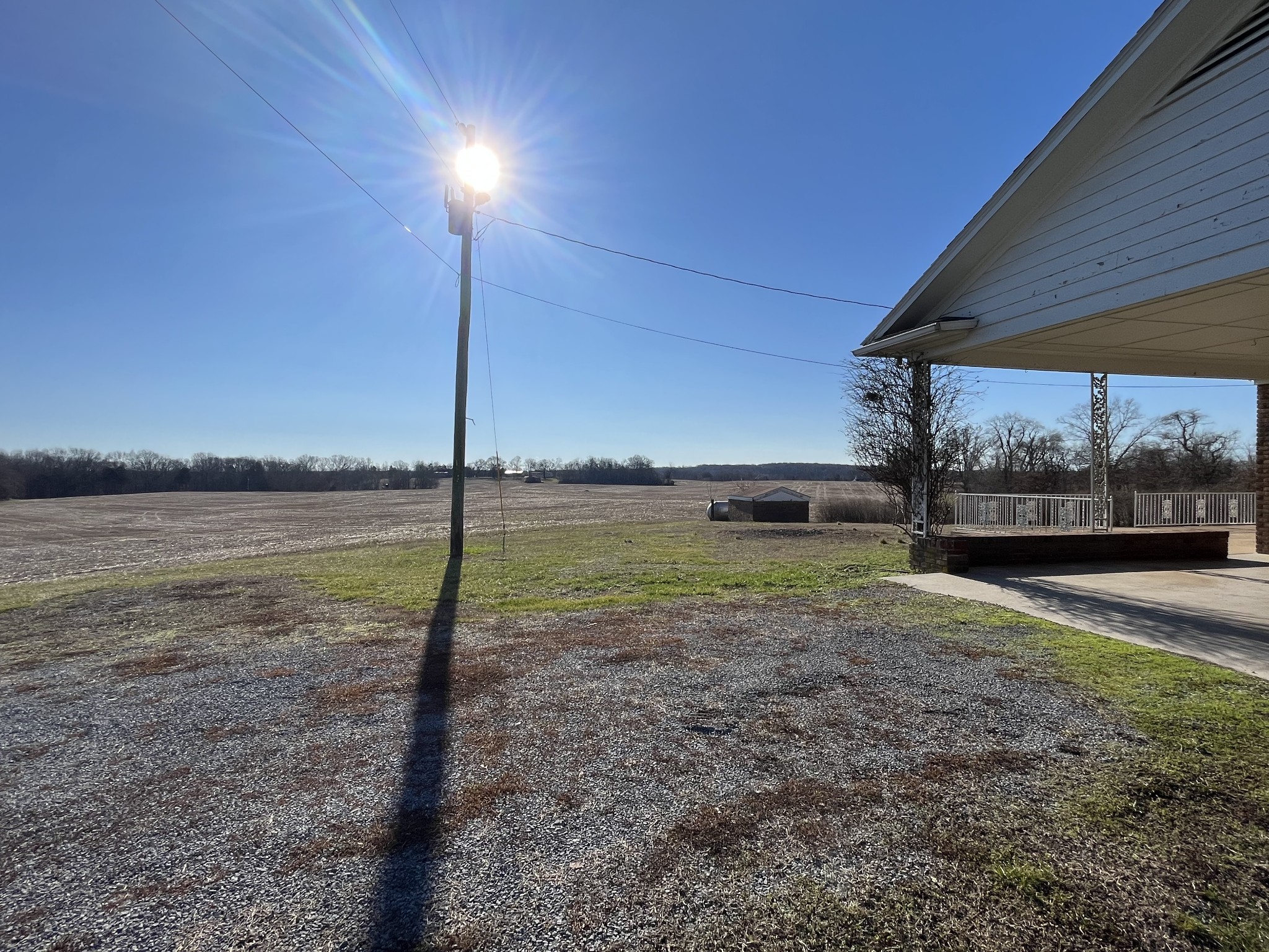 14403 Newstead Road Herndon, KY 42236 - Photo 2 of 25 a view of a big yard next to a house