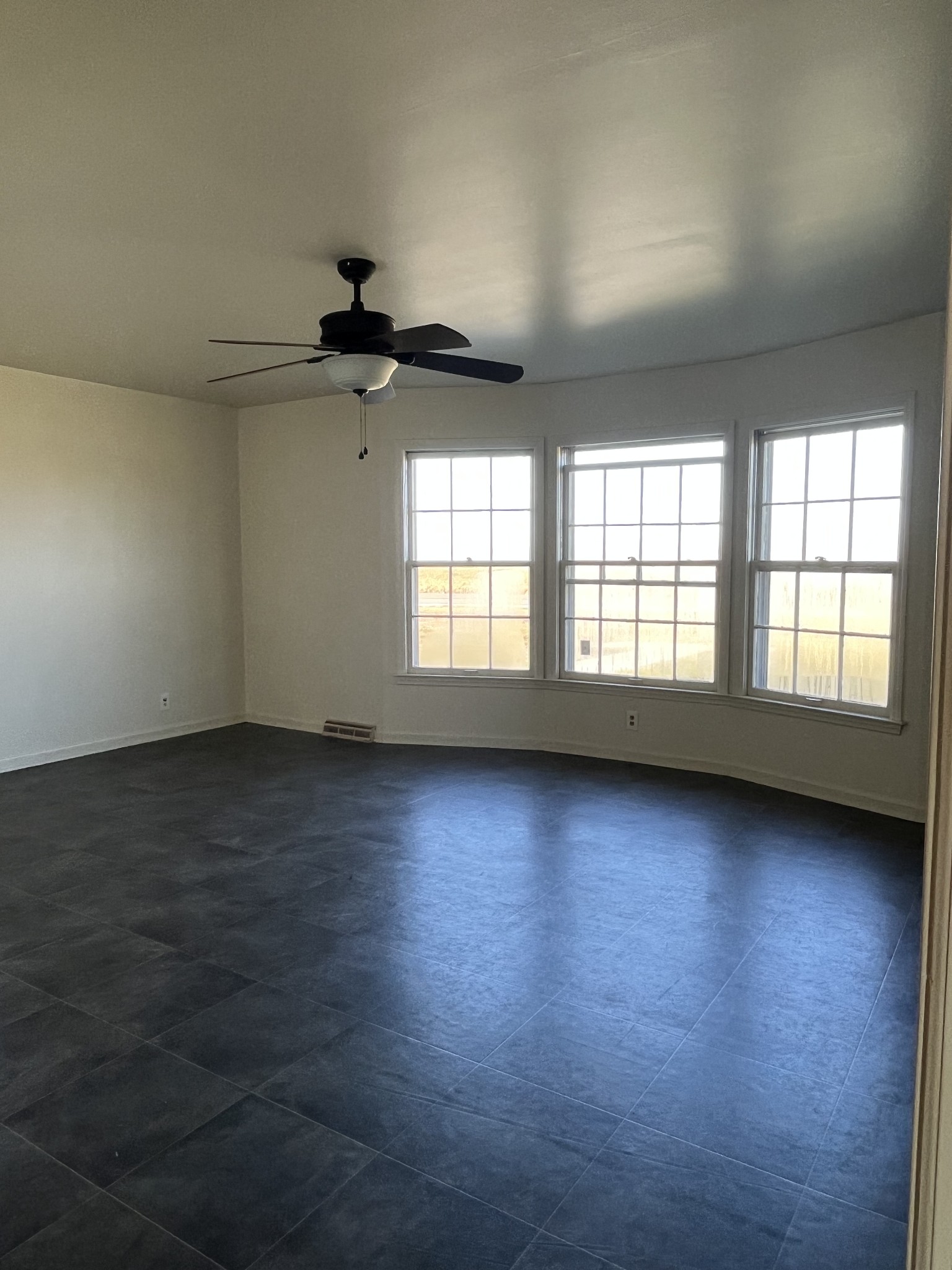 14403 Newstead Road Herndon, KY 42236 - Photo 9 of 25 an empty room with wooden floor and windows