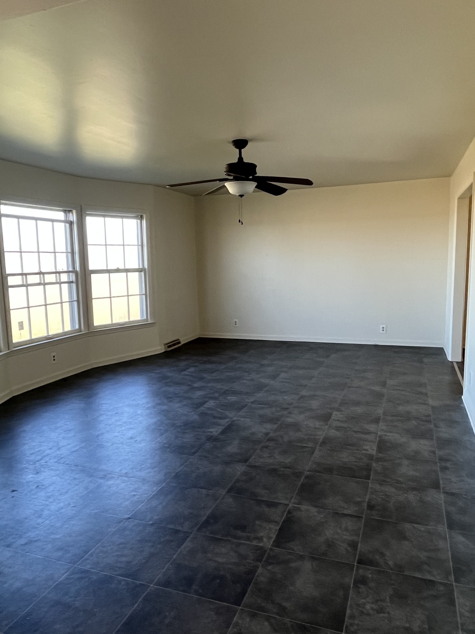 14403 Newstead Road Herndon, KY 42236 - Photo 10 of 25 an empty room with wooden floor and windows