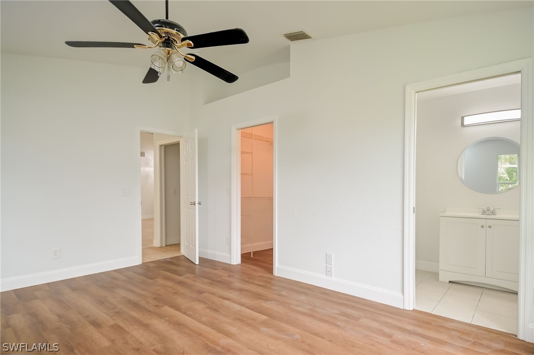 18298 Hepatica Road Fort Myers, FL 33967 - Photo 13 of 25 wooden floor in an empty room