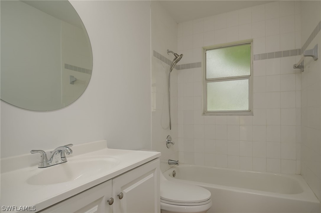 18298 Hepatica Road Fort Myers, FL 33967 - Photo 19 of 25 a bathroom with a sink toilet and shower