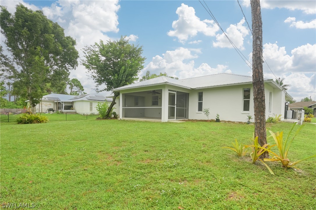18298 Hepatica Road Fort Myers, FL 33967 - Photo 21 of 25 a view of a house with a backyard