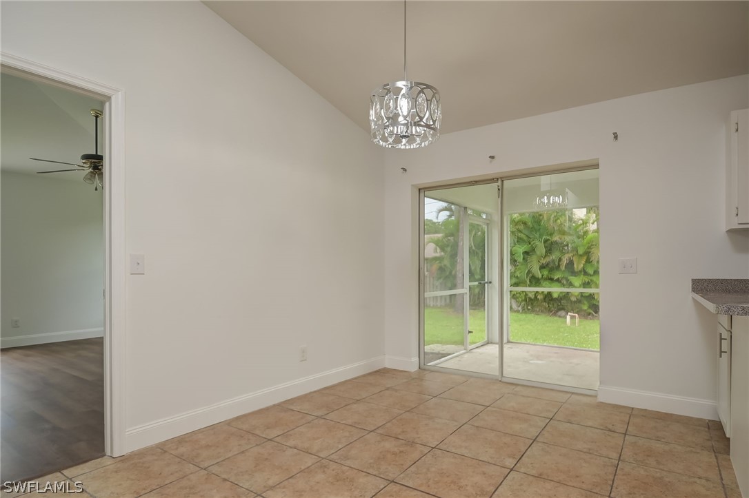 18298 Hepatica Road Fort Myers, FL 33967 - Photo 7 of 25 a view of an empty room with a window