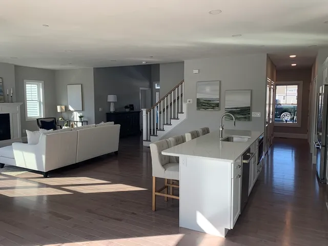 a kitchen with sink and cabinets