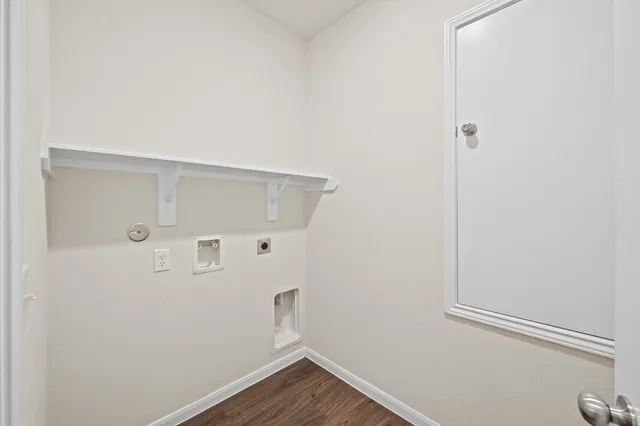 a view of small space with wooden floor