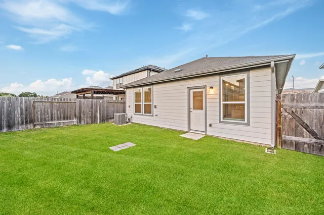 a view of a backyard with a garden