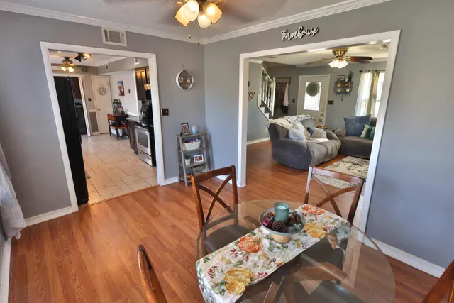 a living room with furniture and a table