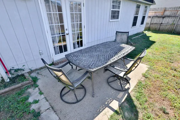 a view of a backyard with a house