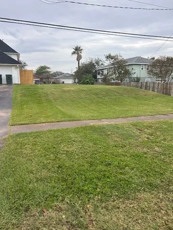 a view of a large body of water with a building in the background