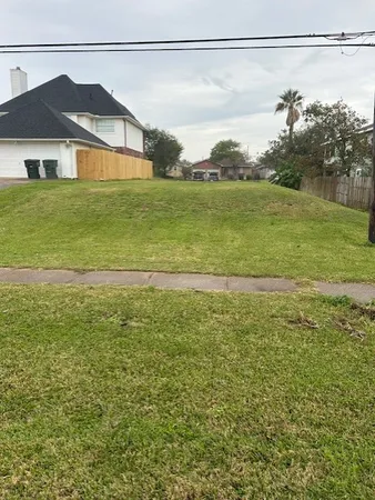 a view of a big yard next to a yard