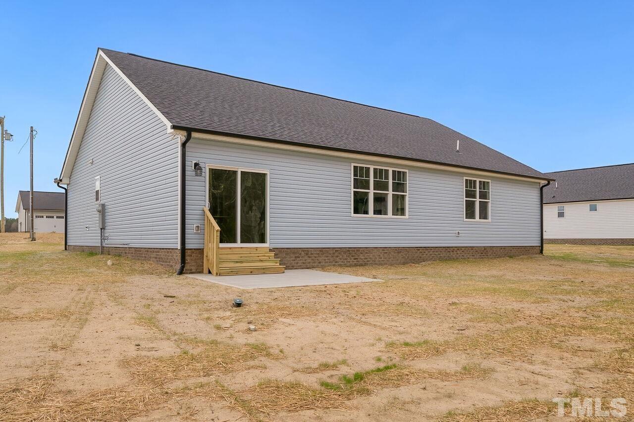 4066 Needham Road Bailey, NC 27807 - Photo 23 of 25 a house that has a large window in front of it