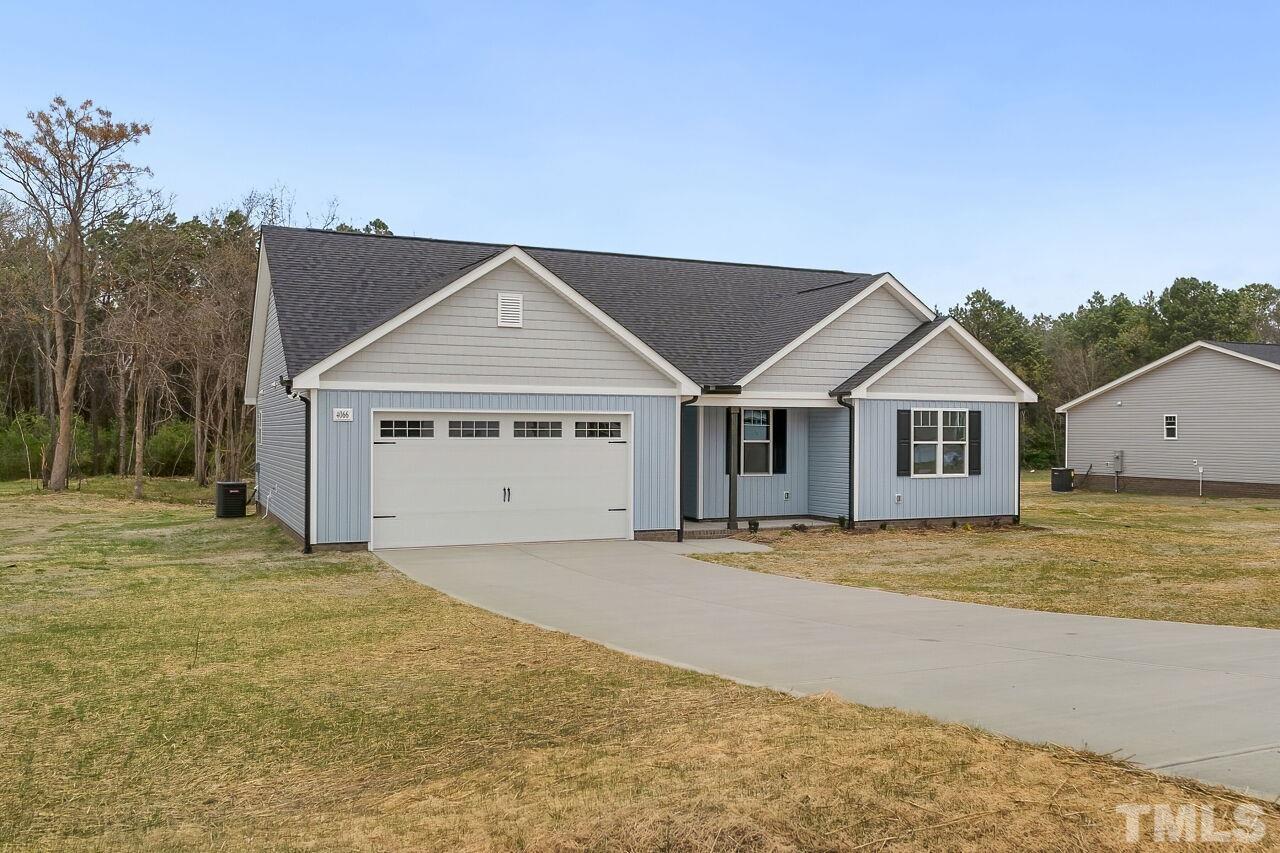 4066 Needham Road Bailey, NC 27807 - Photo 24 of 25 a front view of a house with a yard