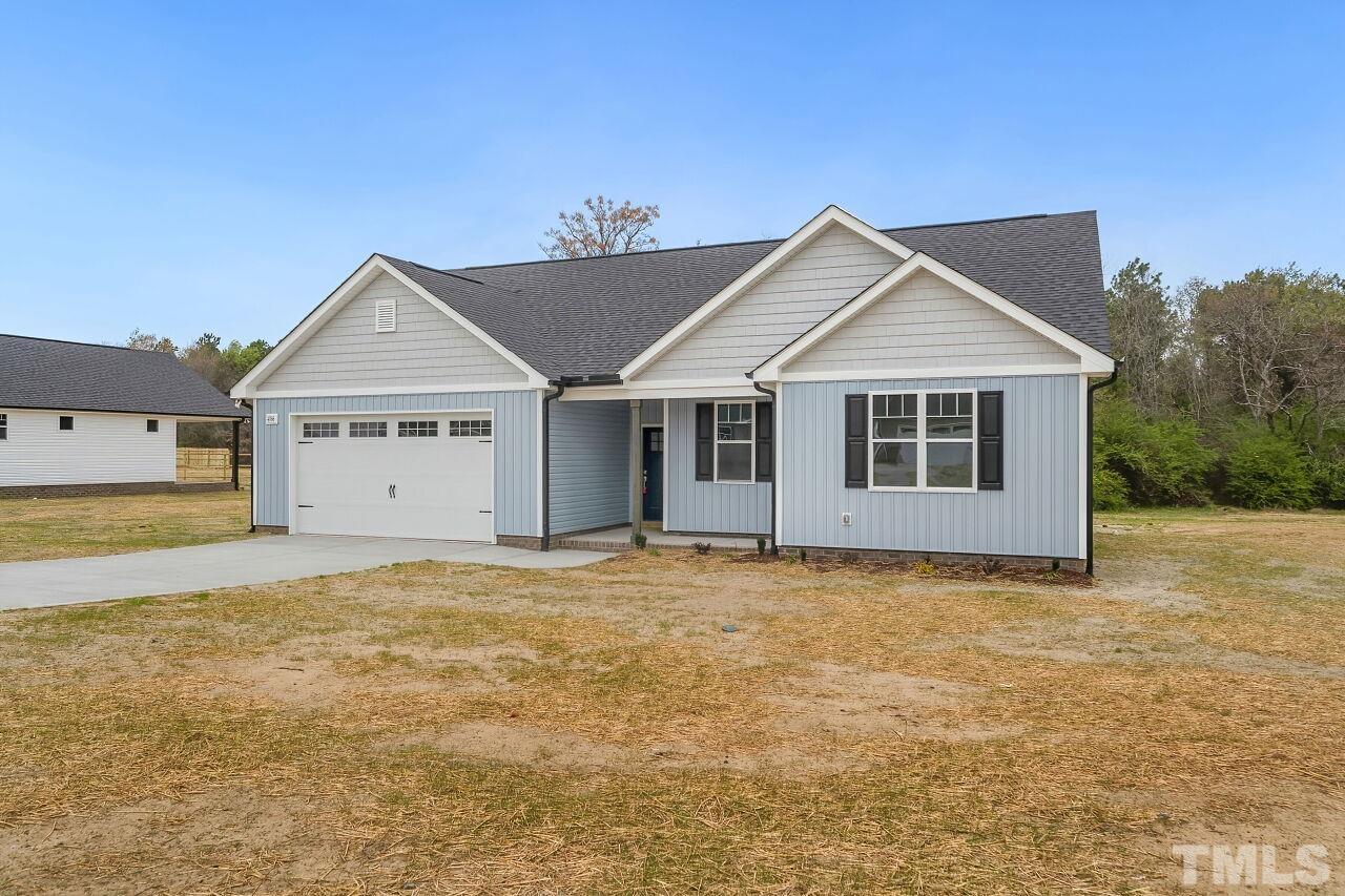 4066 Needham Road Bailey, NC 27807 - Photo 25 of 25 a big house with wooden fence