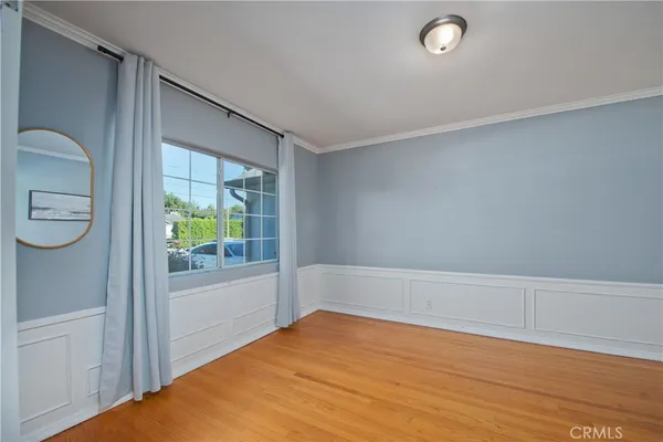 a bathroom with a sink mirror and toilet