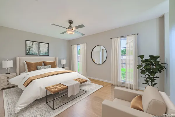 a living room with a couch and a large window