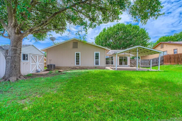 a view of a yard in front of house