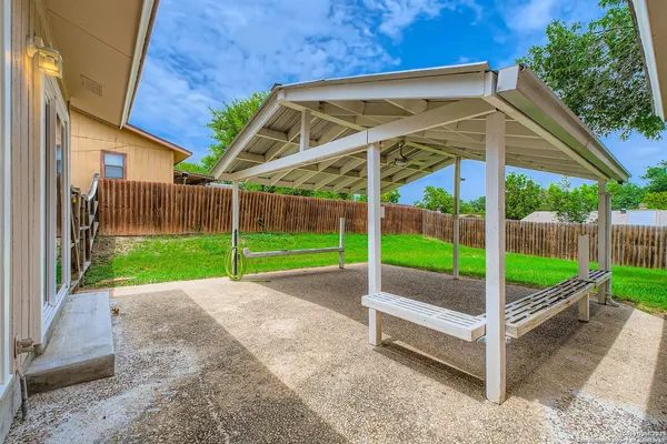 a view of backyard with green space