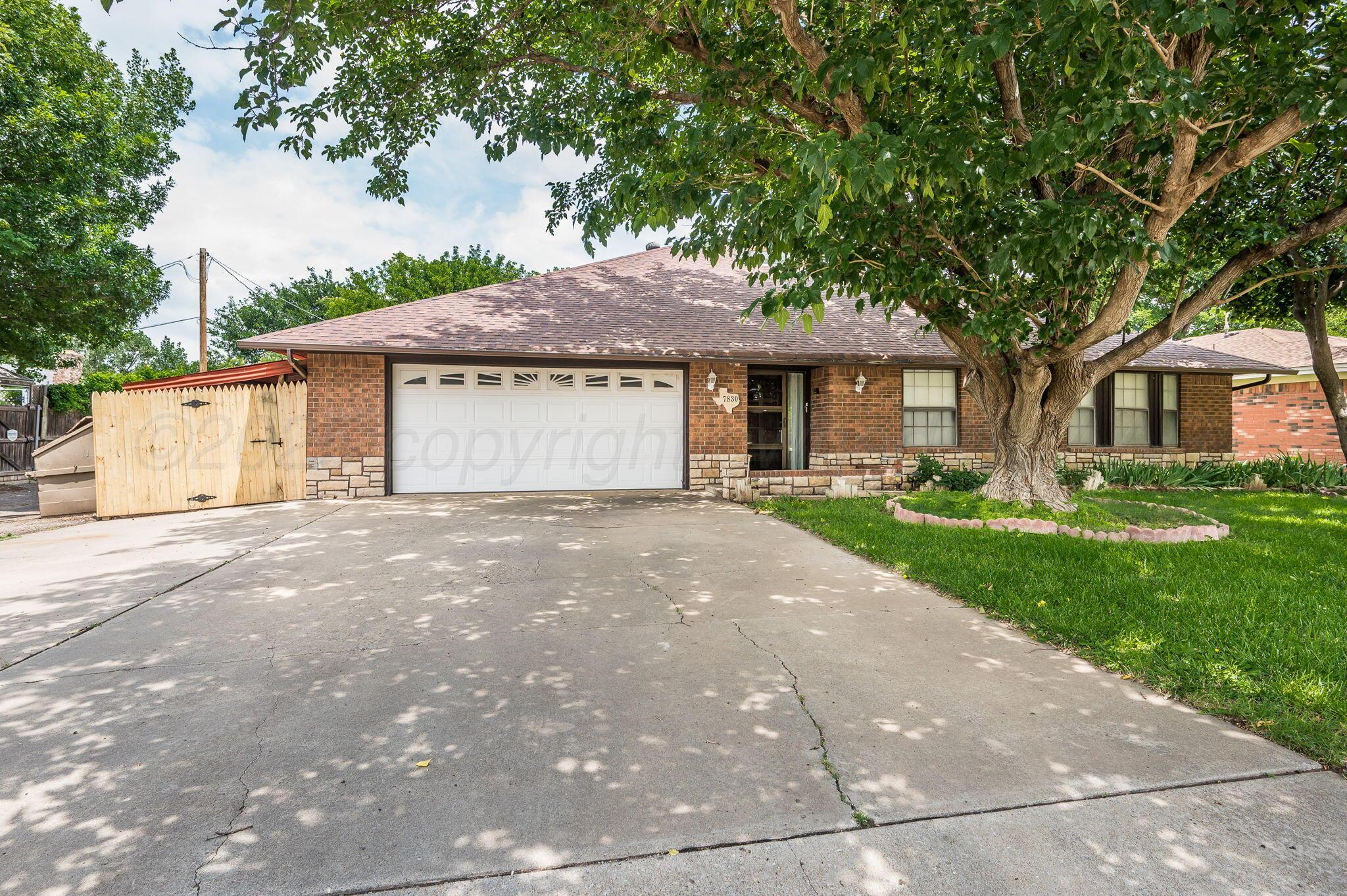 7830 Canode Drive Amarillo, TX 79121 - Photo 2 of 29 a front view of house with yard and green space