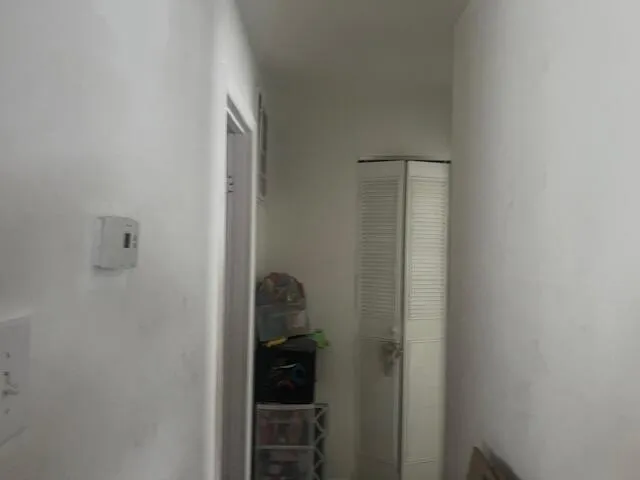 a room with furniture and a window