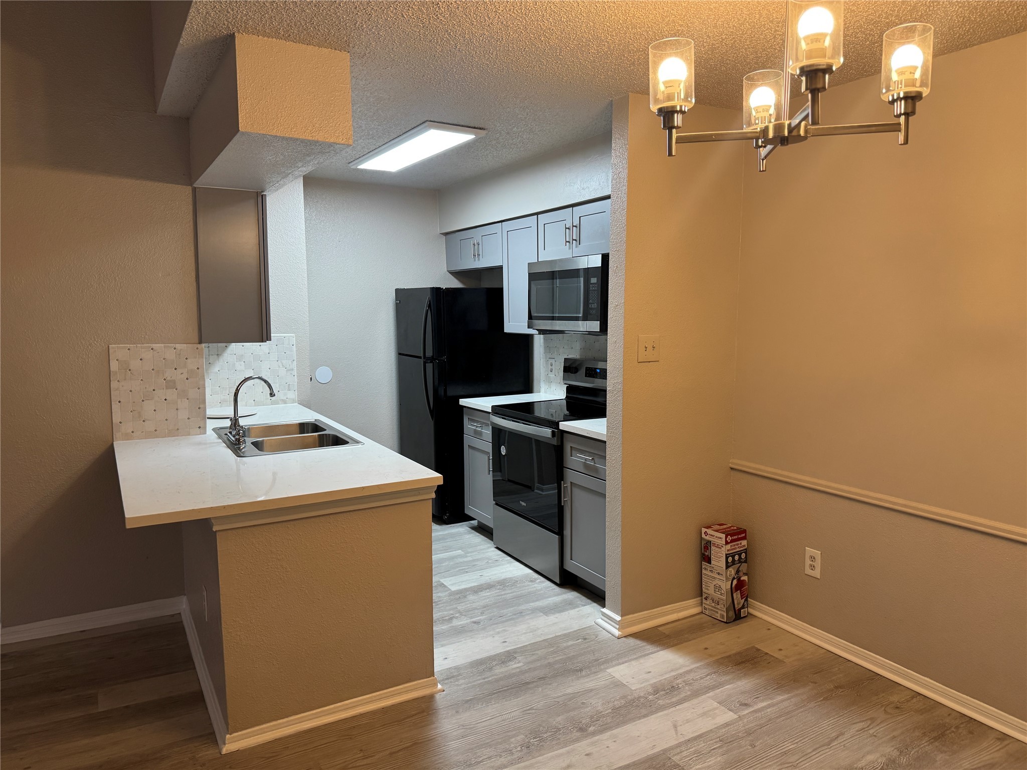 10101 South Gessner Road, Unit 305 Houston, TX 77071 - Photo 13 of 18 a utility room with washer and dryer