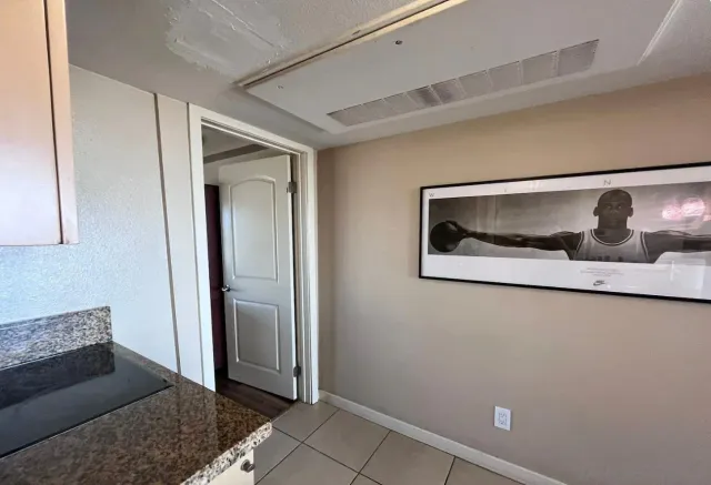 a front view of a house with grey walls