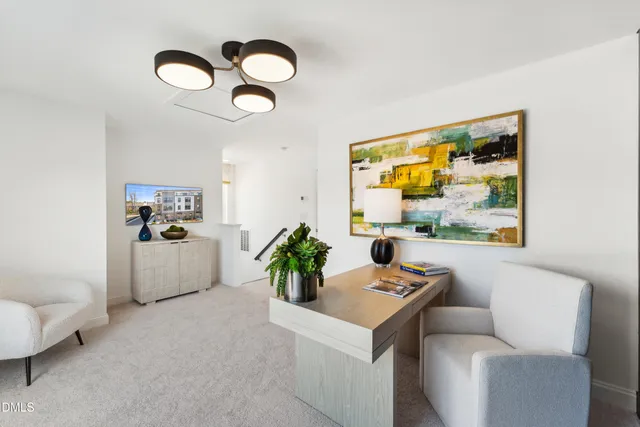a living room with furniture and window
