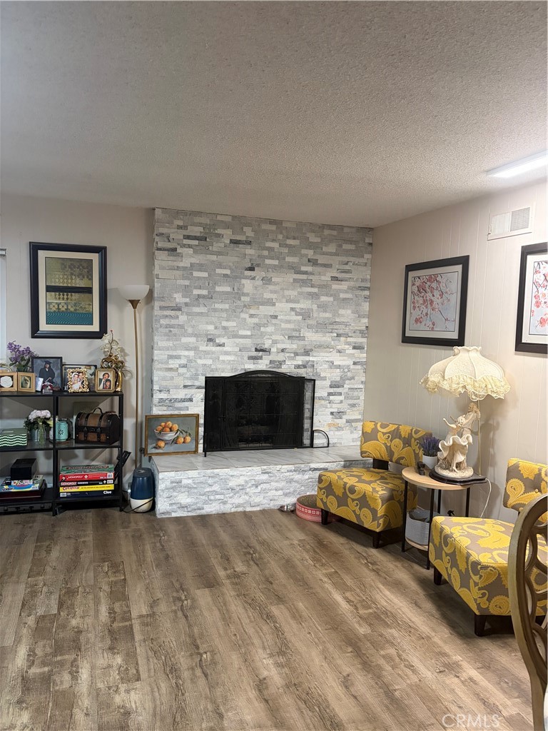 646 El Rancho Drive El Cajon, CA 92019 - Photo 4 of 23 a living room with furniture and a fireplace