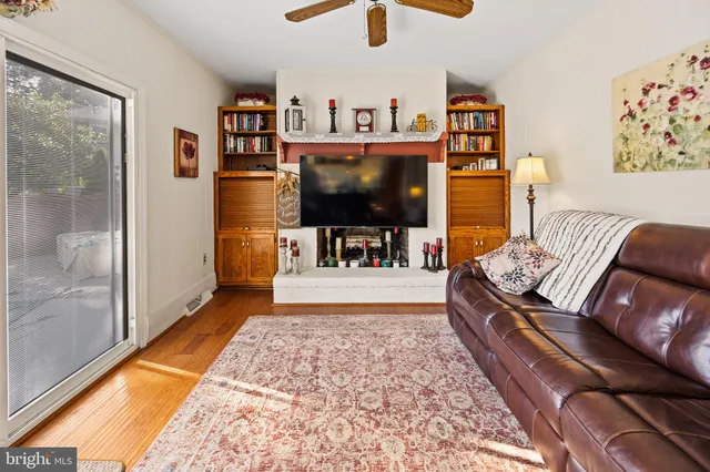 a living room with furniture and a rug