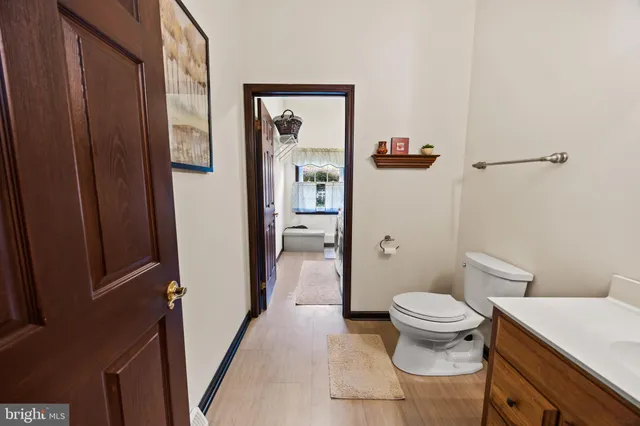 a bathroom with a sink and toilet