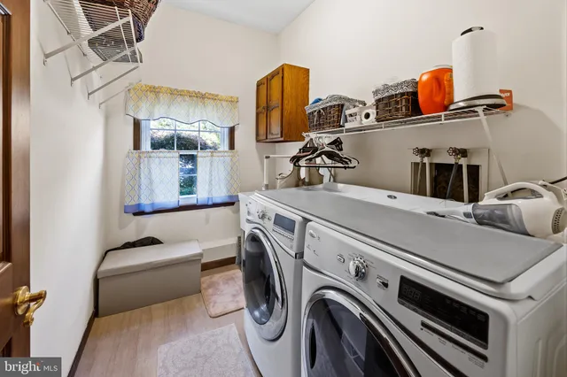 a utility room with dryer and washer