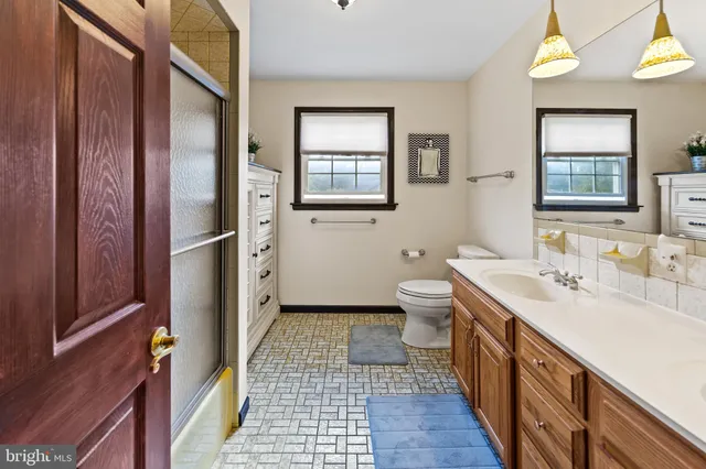 a bed room with furniture and a window