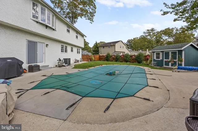 a front view of a building with garden