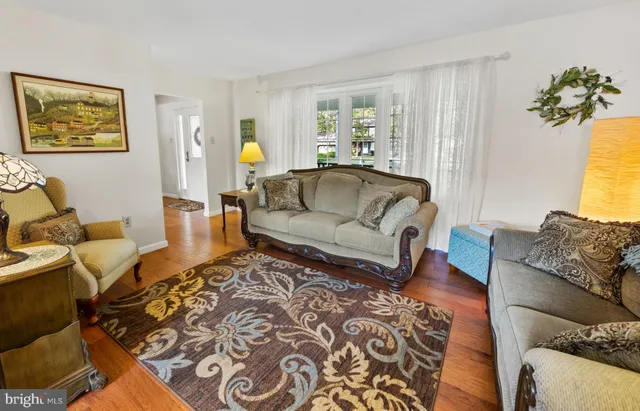 a living room with furniture and a couch