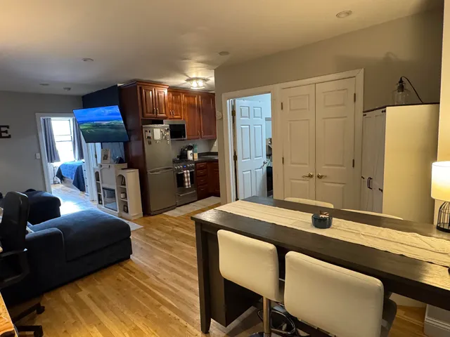 a living room with furniture and a table