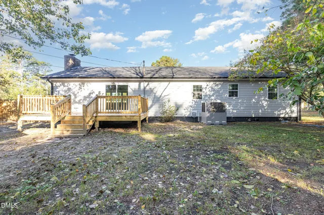 a view of deck with wooden floor and fence