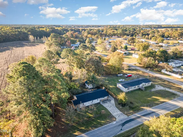 a backyard of a house with lots of green space