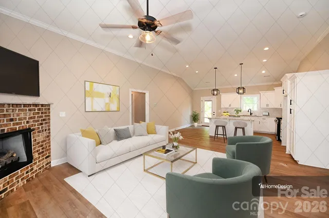 a large kitchen with a lot of counter space and wooden floor