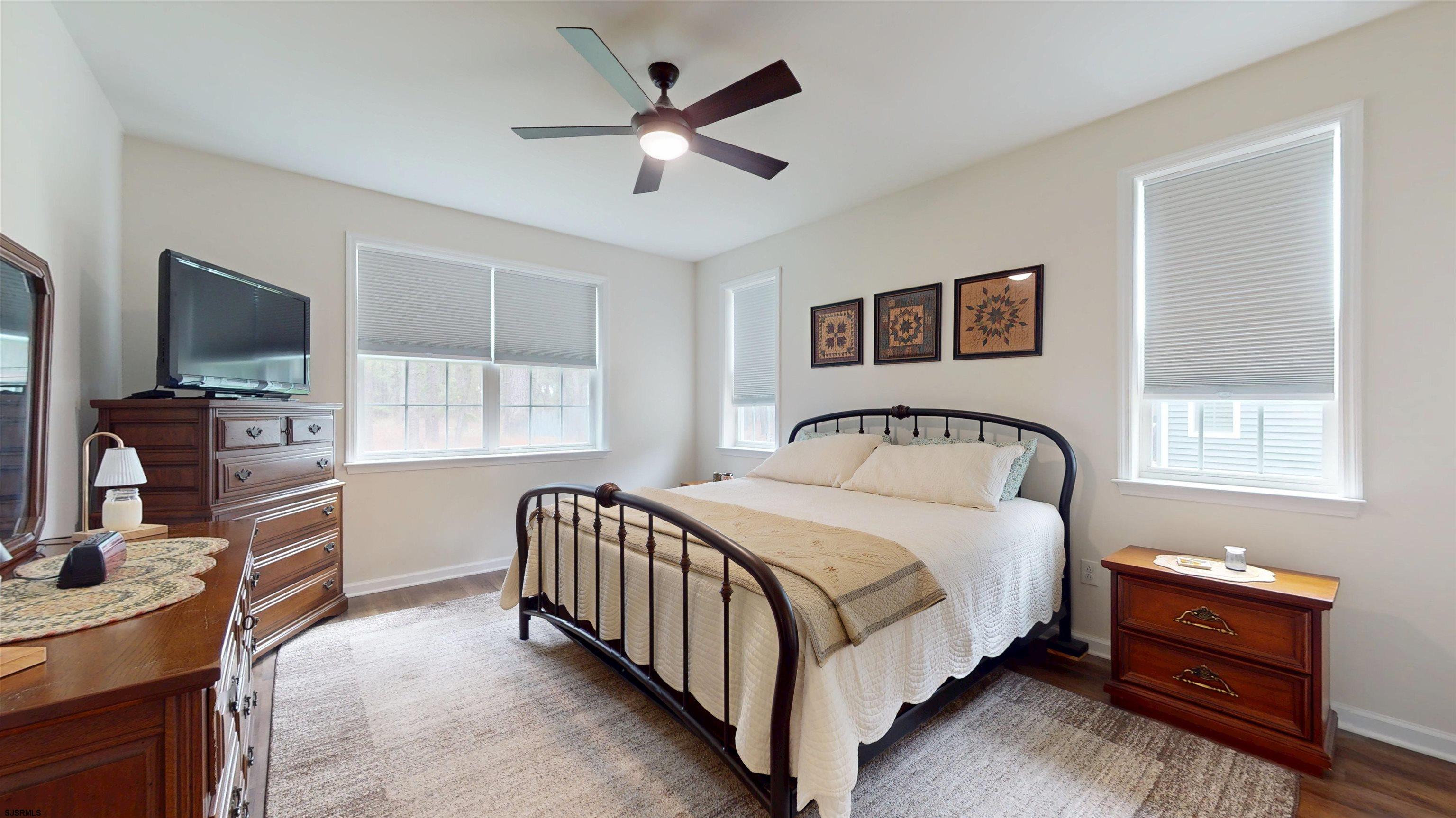 185 Keller Way Mays Landing, NJ 08330 - Photo 25 of 56 a bedroom with a bed and a flat screen tv