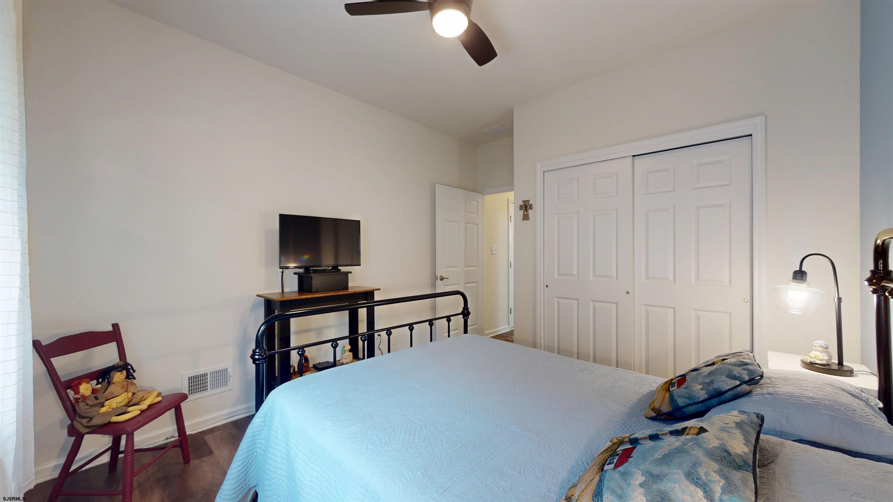 185 Keller Way Mays Landing, NJ 08330 - Photo 34 of 56 a bedroom with a bed and a chair in it