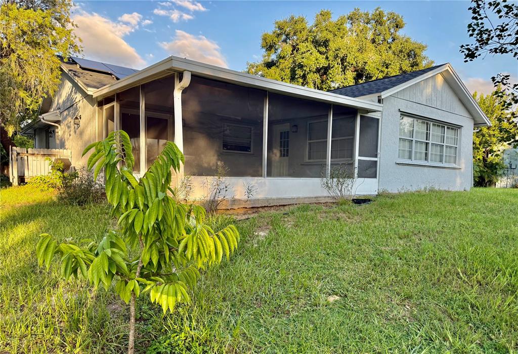 970 Amy Ridge Court Kissimmee, FL 34747 - Photo 17 of 18 a view of a house with a yard
