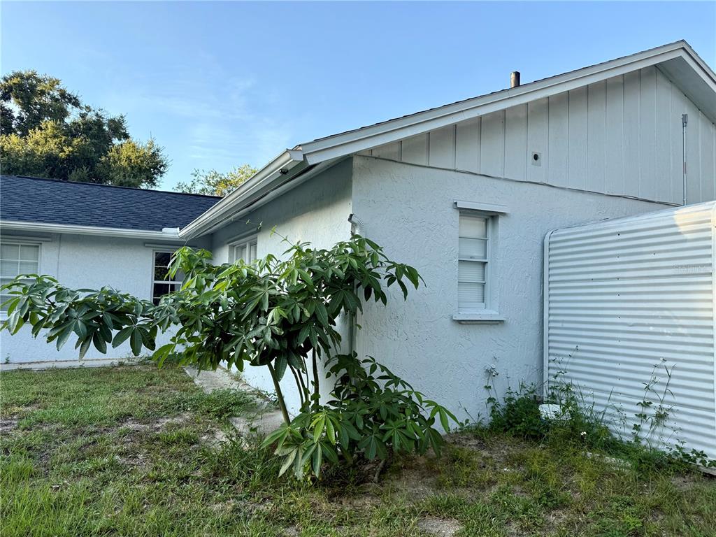 970 Amy Ridge Court Kissimmee, FL 34747 - Photo 18 of 18 a view of a house with a yard