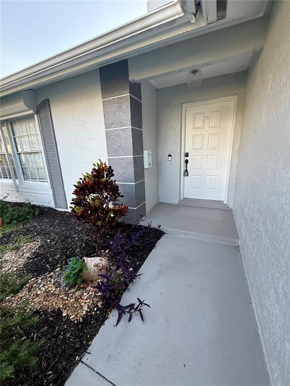 970 Amy Ridge Court Kissimmee, FL 34747 - Photo 5 of 18 a view of a house with a yard