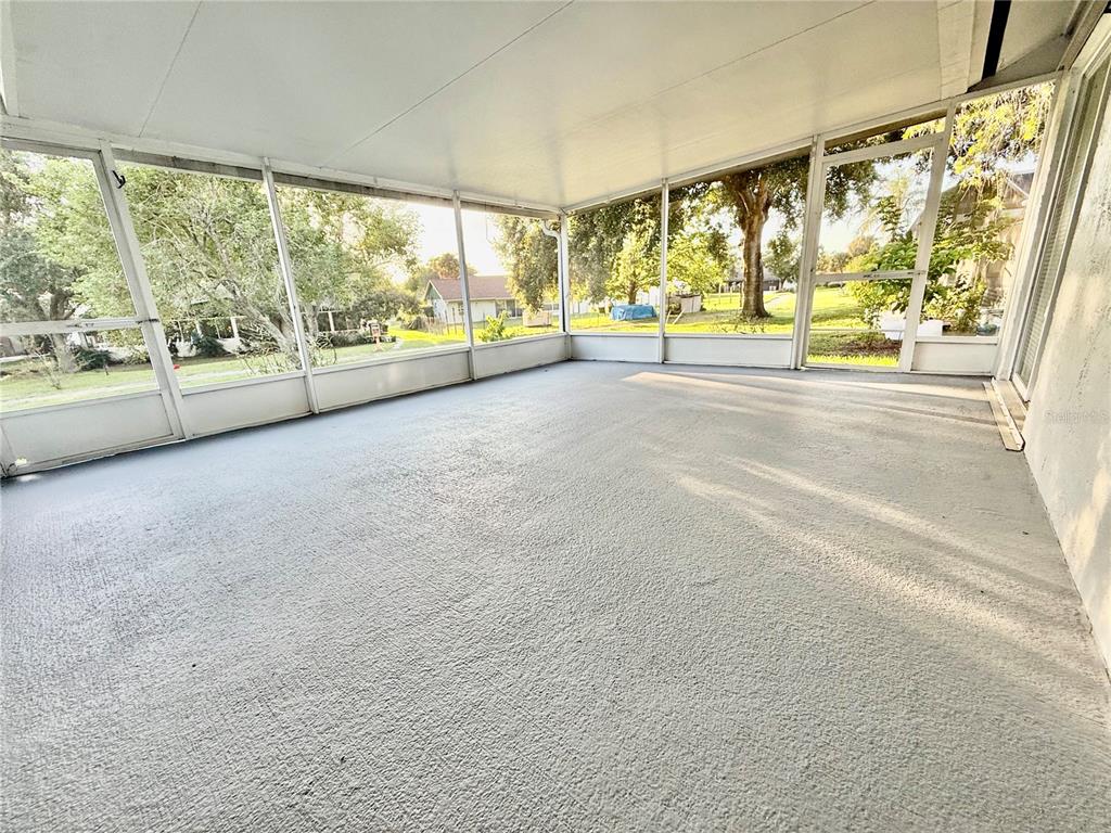 970 Amy Ridge Court Kissimmee, FL 34747 - Photo 10 of 18 a view of hallway with an outdoor space