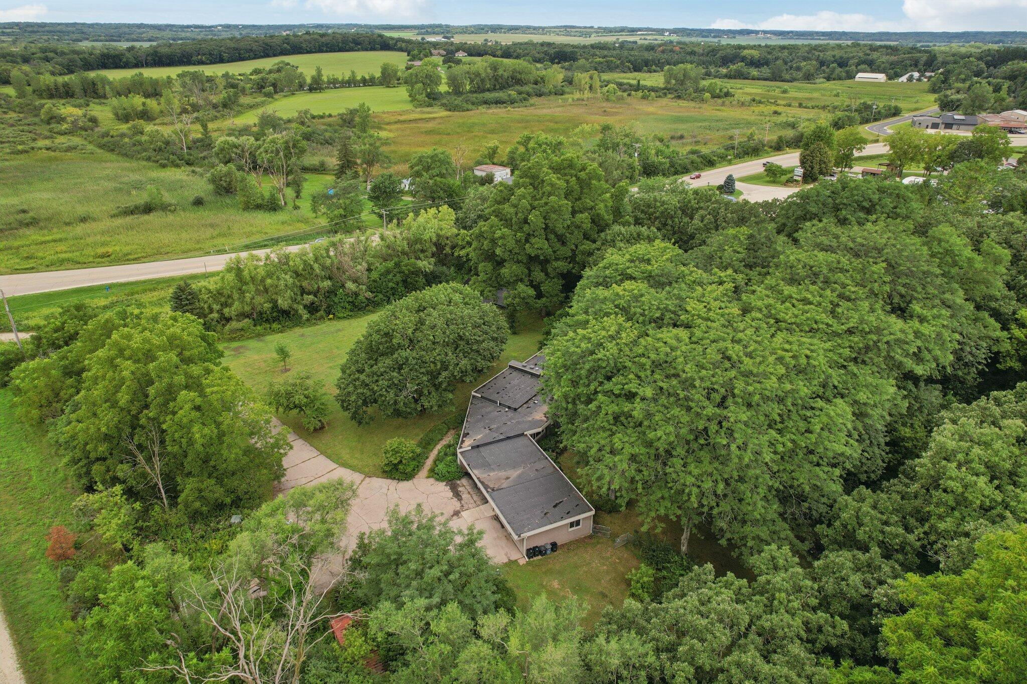 1009 Spring Valley Road Burlington, WI 53105 - Photo 44 of 49 Though private and surrounded by nature, city amenities are nearby.