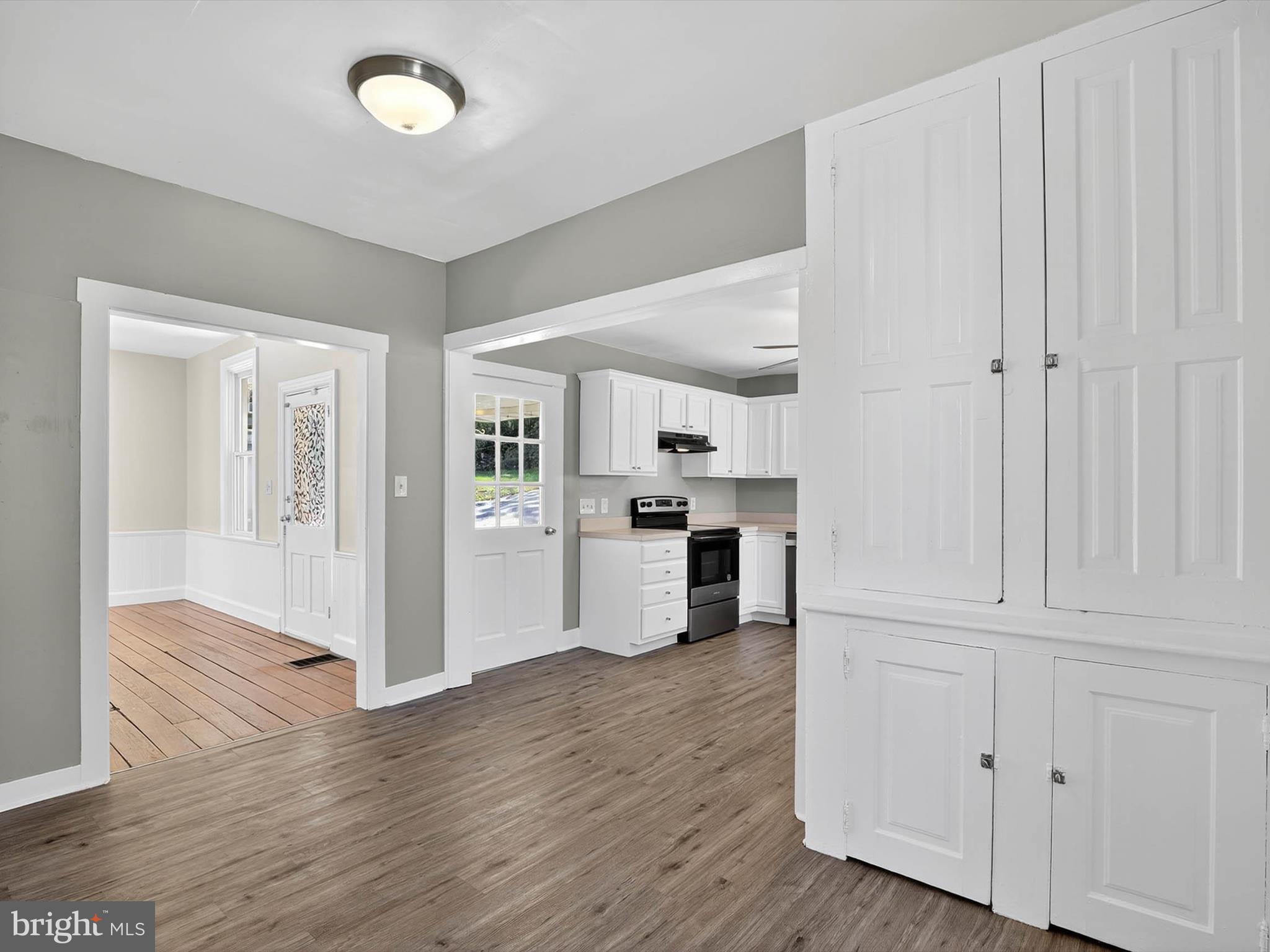 5334 Strasburg Road Kinzers, PA 17535 - Photo 11 of 44 a view of a kitchen with wooden floor and electronic appliances