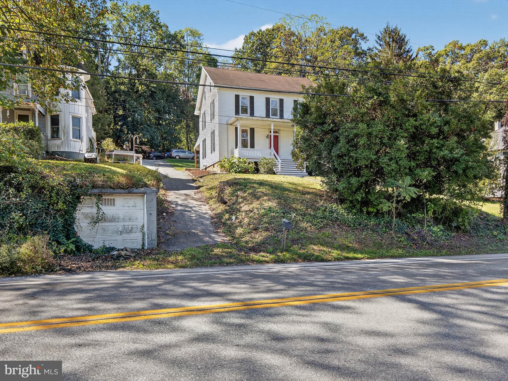 5334 Strasburg Road Kinzers, PA 17535 - Photo 2 of 44 a front view of a house with a yard