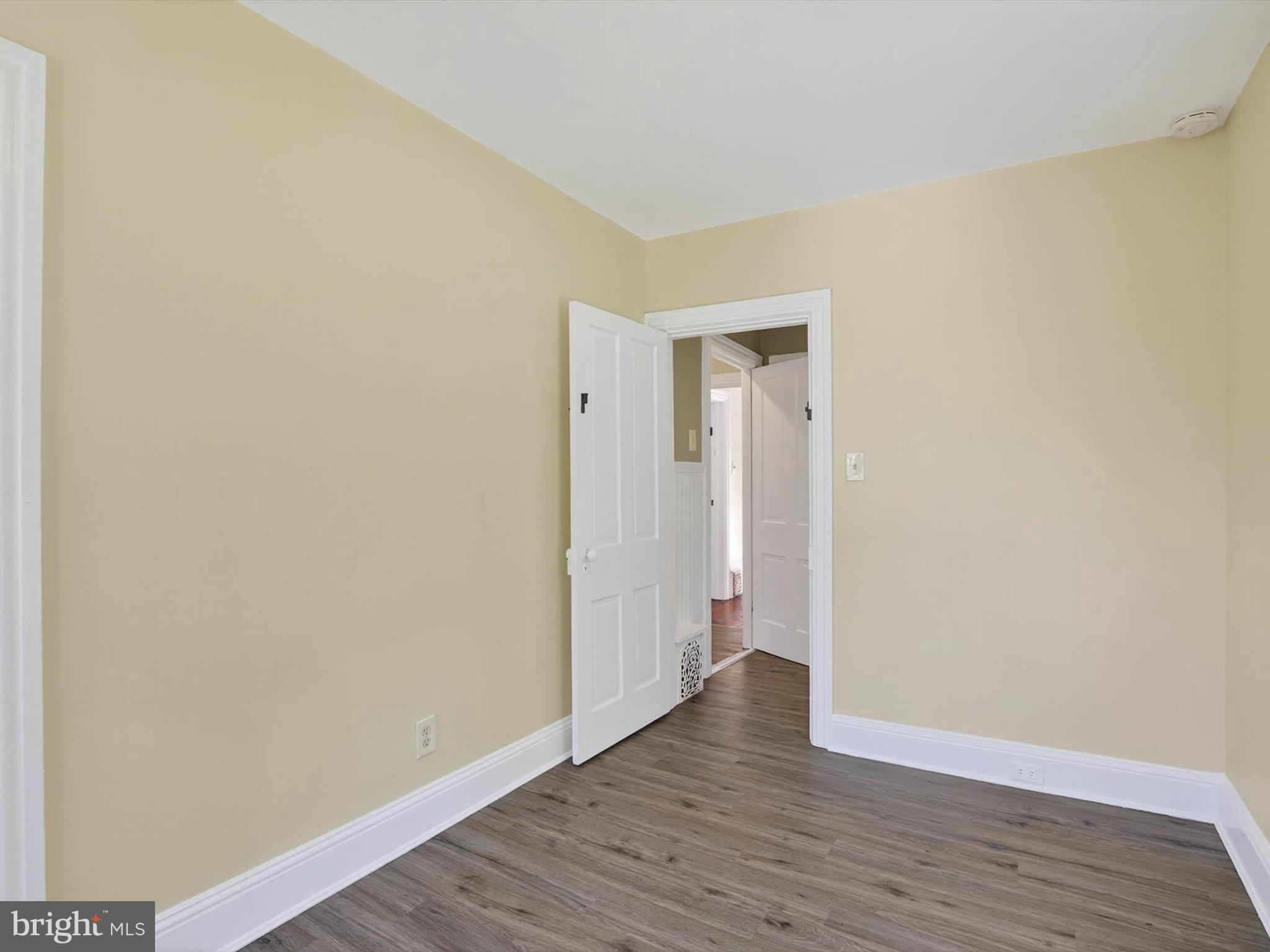 5334 Strasburg Road Kinzers, PA 17535 - Photo 22 of 44 a view of an empty room with wooden floor