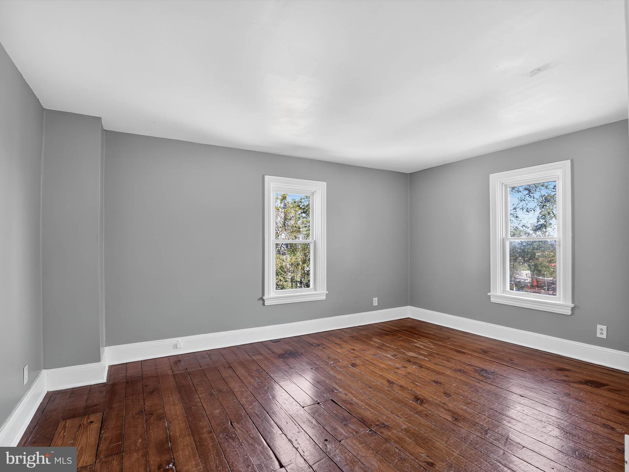 5334 Strasburg Road Kinzers, PA 17535 - Photo 27 of 44 an empty room with wooden floor and windows