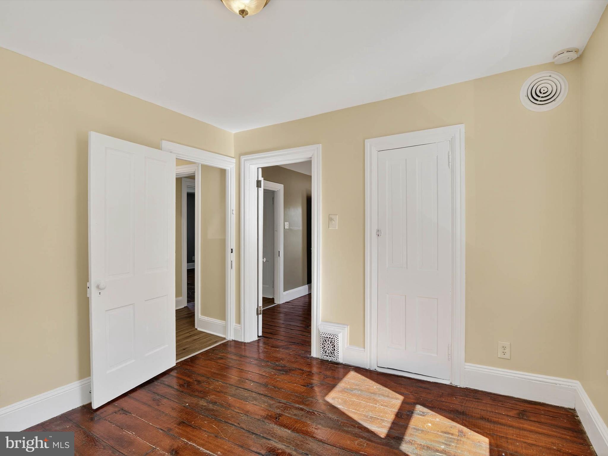 5334 Strasburg Road Kinzers, PA 17535 - Photo 30 of 44 an empty room with wooden floor and closet